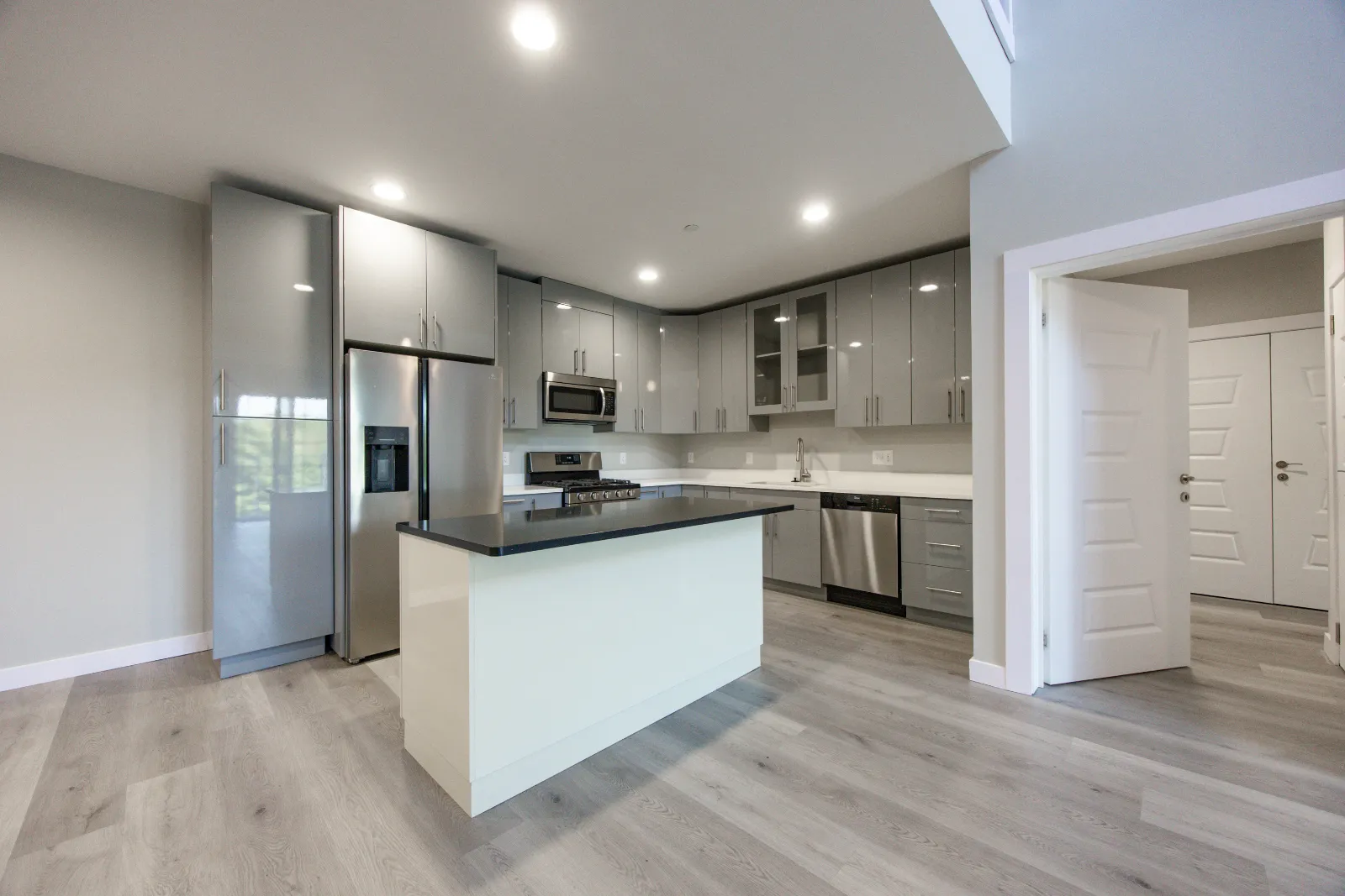 Kitchen with island — Taj Estates of Franklin I