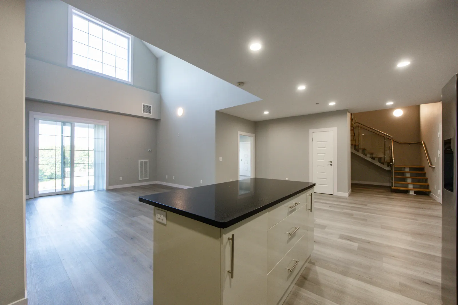 Kitchen island and dining area — Taj Estates of Franklin I